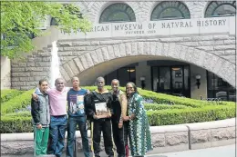  ??  ?? NEW EXPERIENCE: The Queen’s College group on their way to visit the American Museum of Natural History in New York, from left, Emilio Smith, Qhawe Bula, Aphendulwe Ngqola, Lawrence Lwanga, Ndayeni Manzi and their teacher, Thobeka Sihlahla