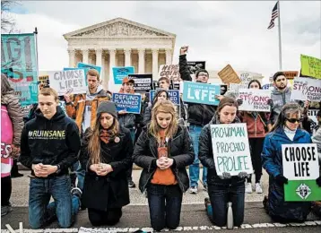  ?? DREW ANGERER/GETTY ?? Anti-abortion activists in the U.S. are optimistic because of the GOP majorities in Congress and President Donald Trump.