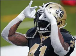  ?? BUTCH DILL — THE ASSOCIATED PRESS ?? New Orleans Saints running back Alvin Kamara (41) reacts after his touchdown carry in the second half of a game against the Kansas City Chiefs in New Orleans last Sunday.