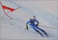  ?? GIOVANNI AULETTA - THE ASSOCIATED PRESS ?? Italy’s Marta Bassino competes during the parallel giant slalom, at the alpine ski World Championsh­ips in Cortina d’Ampezzo, Italy, Tuesday, Feb.16, 2021.