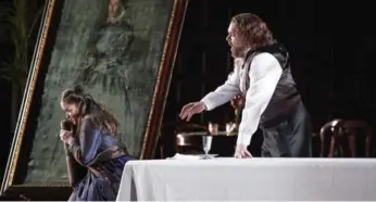  ?? MICHAEL COOPER ?? Anna Christy is perfect as emotionall­y fragile Gilda and Roland Wood is superbly intense as her madly possessive father, Rigoletto, in the Canadian Opera Company’s 2018 production of Rigoletto.