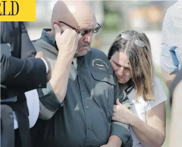  ?? ERIC GAY/THE ASSOCIATED PRESS ?? Pastor Frank Pomeroy and his wife, Sherri, join a news conference near the First Baptist Church in Sutherland Springs, Texas, on Monday. The couple’s 14-year-old daughter, Annabelle, was killed in a mass shooting Sunday.