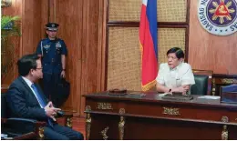  ?? (PCO) ?? President Ferdinand Marcos Jr. (center) meets with Chinese Ambassador Huang Xilian (left) on Tuesday, February 14.