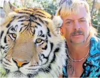  ??  ?? Joe Exotic and furry friend in Tiger King