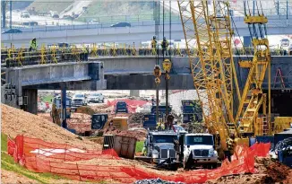  ?? HYOSUB SHIN/HYOSUB.SHIN@AJC.COM ?? President Joe Biden’s $2.3 trillion infrastruc­ture plan includes $115 billion for bridge, highway and road repairs; $85 billion for transit rehabilita­tion and expansion; and $17 billion for waterways, ports and ferries. It also includes money for nontraditi­onal items such as long-term care facilities and clean energy.
