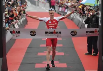  ??  ?? Alistair wins the bike/run Ironman Ireland to stamp his ticket to Kona