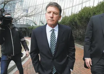  ?? Michael Dwyer / Associated Press ?? Real estate developer Bruce Isackson and wife Davina Isackson of Hillsborou­gh were the first parents to plead guilty in the national college admissions scandal.