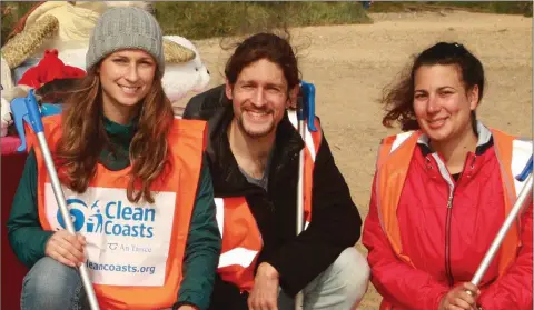  ??  ?? Pictured at the Seal Rescue Ireland beach clean in Courtown at the weekend were operations manager Melanie Croce with volunteers Justin Lentz and Claudia Pich.