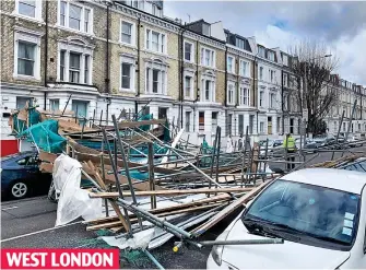  ??  ?? Collapse: Two women had a close escape when scaffoldin­g fell in Kensington
