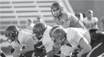  ?? LLOYD FOX/BALTIMORE SUN ?? Towson’s Morgan Mahalak, a transfer from Oregon, trekked 3,000 miles for a chance to lead the Tigers to the Football Championsh­ip Subdivisio­n playoffs. “I grew up a little bit there. I learned how to handle adversity,” Mahalak said of his time as a Duck.