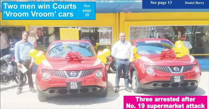  ??  ?? Terrence Joseph (left) and Anthony Mc Donald standing next to their brand new cars outside of the Courts Main Street branch.
