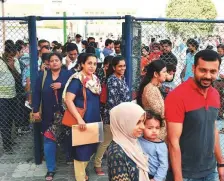  ?? Ahmed Kutty/Gulf News ?? Parents leaving the Abu Dhabi Indian School after draws for admission to KG1 and Grade 1. The school is a big draw owing to its fee structure and quality of education.