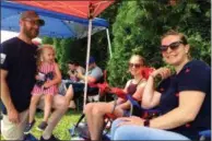  ?? GLENN GRIFFITH -MEDIANEWS GROUP ?? The Pinnell family readies for the Clifton Park July Fourth Celebratio­n parade. Left to right are: Eric, River,3, Megan, 13, and Brittany.