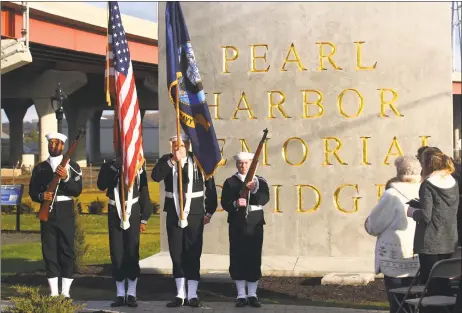  ?? Christian Abraham / Hearst Connecticu­t Media ?? A U.S. Navy Color Guard from the Naval Submarine School in Groton presents the colors during the Pearl Harbor Memorial Park dedication ceremony on East Street in New Haven Thursday.