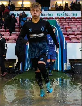  ??  ?? Kai Kennedy takes to the pitch for Rangers Colts in the Challenge Cup