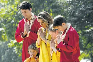  ?? SEAN KILPATRICK/THE CANADIAN PRESS ?? Prime Minister Justin Trudeau and wife Sophie Gregoire Trudeau, and children, Xavier, 10, Ella-Grace, 9, and Hadrien, 3, visit Sabarmati Ashram (Gandhi Ashram) in Ahmedabad, India, on Monday.