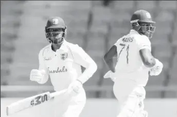  ??  ?? Nkrumah Bonner (left) and Kyle Mayers bat during their hundred-run stand on the final day of the opening Test on Thursday.