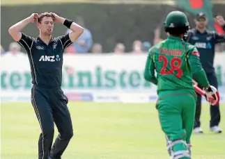  ?? PHOTO: INPHO ?? New Zealand’s Matt Henry, left, can’t watch as Tamim Iqbal moves Bangladesh closer to their winning target.