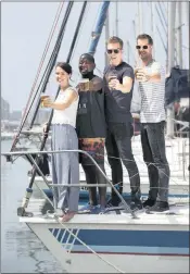  ??  ?? PROST! Imitating the famous scene from Titanic, sailors Charlotte Marshall and Nhlanhla Phakathi, together with Afrikaans band members Tristan Wentzel and Louis Nel of Systraat Serenade, gear up for the fun-filled Germanthem­ed Beer and Bratwurst on the...