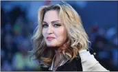  ?? BEN STANSALL — GETTY IMAGES NORTH AMERICA ?? Madonna poses arrives on the red carpet to attend a special screening of the film “The Beatles: Eight Days A Week — The Touring Years” in London in 2016.