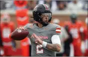  ?? BUTCH DILL — THE ASSOCIATED PRESS ?? American quarterbac­k Spencer Rattler of South Carolina throws a pass during the first half of the Senior Bowl on Saturday in Mobile, Ala.
