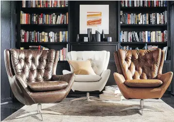  ?? — POTTERY BARN ?? The Wells swivel chair from Pottery Barn sports chic tufting and the wing silhouette and comes in an array of hues.