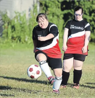  ?? LANCE ANDERSON PETERBOROU­GH THIS WEEK ?? Special Olympics athletes from Peterborou­gh, who are representi­ng Ontario at the Special Olympics Canada 2018 Summer Games, practice their soccer skills during a practice at Keith Wightman Public School on July 17.