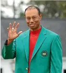  ??  ?? Tiger Woods’ fifth green jacket may be his finest achievemen­t.