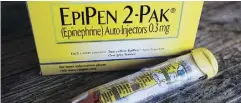  ?? THE CANADIAN PRESS/FILES ?? EpiPens, which offer life-saving treatment for allergic reactions, are in short supply at Canadian pharmacies.