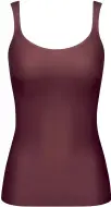  ??  ?? A seamless base for under T-shirts and jumpers, this smooths without constraini­ng: vest top, £26, triumph.com