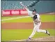  ?? DAVID J. PHILLIP — THE ASSOCIATED PRESS ?? Houston Astros starting pitcher Justin Verlander throws against the Seattle Mariners during the third inning of a baseball game Friday, July 24, 2020, in Houston.