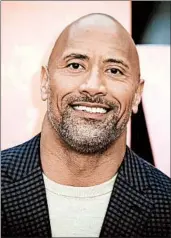  ?? VIANNEY LE CAER/INVISION 2018 ?? Dwayne Johnson will host a global concert calling on world leaders to make coronaviru­s tests available for all.