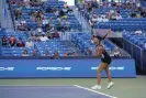  ?? Photograph: Jeff Dean/AP ?? Jessica Pegula serves to Emma Raducanu at the Western and Southern Open.