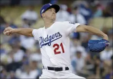  ?? MARCIO JOSE SANCHEZ THE ASSOCIATED PRESS ?? Los Angeles Dodgers starting pitcher Walker Buehler throws to a Washington Nationals batter during the first inning of Game 1 of a baseball National League Divisional Series on Thursday, Oct. 3, 2019, in Los Angeles.