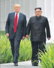  ?? AFP FILE ?? ▪ North Korean leader Kim Jong Un (right) walks with US President Donald Trump during a break in talks at their summit at the Capella Hotel on Sentosa island in Singapore.