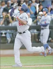  ?? Mike Stobe Getty Images ?? BUILDING on a career-best season, Yasiel Puig hit his 21st home run to break a 3-3 tie in the seventh.