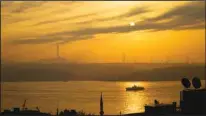  ?? ?? A ferry sails along the Bosphorus as the sun rises in Istanbul, Turkey, Thursday, Nov. 3, 2022. (AP)