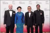  ?? PROVIDED TO CHINA DAILY ?? Chief Executive Carrie Lam Cheng Yuet-ngor, Yidan Prize founder Charles Chen Yidan (second right) and laureates Larry Hedges (left) and Anant Agarwal (right) at the ceremony.