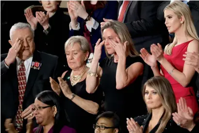  ?? AFP ?? Carryn Owens, widow of Chief Special Warfare Operator William ‘Ryan’ Owens, wipes her eyes on the Capitol Hill. —