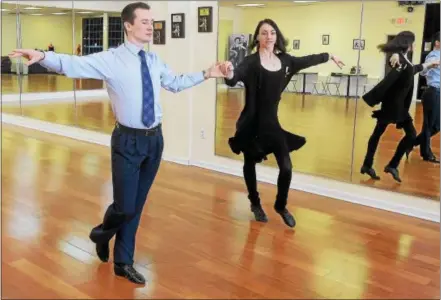  ?? PETE BANNAN – DIGITAL FIRST MEDIA ?? Dmitry Karabanov and Daria Emelianova demonstrat­e dance moves at their new Fred Astaire Dance Studio at the Westtown Village Shopping Center, 1173 Wilmington Pike.