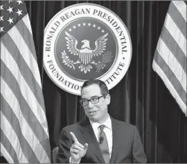  ?? Frederic J. Brown AFP/Getty Images ?? IN A LETTER to lawmakers last month, Treasury Secretary Steven T. Mnuchin said “honoring the full faith and credit of the United States is” crucial.