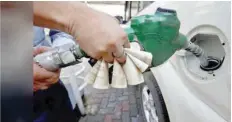  ?? — Reuters ?? The Kerala government has announced a Re 1 reduction per litre in the price of petrol and diesel from Friday, in a bid to bring some relief to the people hit by rising fuel costs.