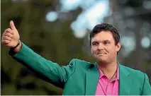  ?? GETTY IMAGES ?? American golfer Patrick Reed looks comfortabl­e in his green jacket following his US Masters win at Augusta National.