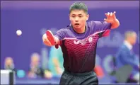  ?? PHOTO: CNA ?? Taiwan’s Peng Wang-wei returns to Mohamed Shaffan Ismail of the Maldives in their Asian Games men’s team table tennis match in Hangzhou, China, yesterday.