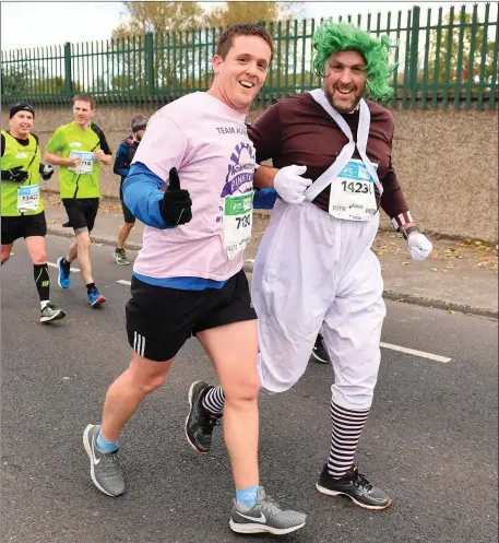  ??  ?? Trevor Coady from Kilkenny, left, and Martin O’Sullivan from Kerry during the 2018 SSE Airtricity Dublin Marathon. 20,000 runners took to the Fitzwillia­m Square start line to participat­e in the 39th running of the SSE Airtricity Dublin Marathon, making it the fifth largest marathon in Europe Photo by Sam Barnes/Sportsfile