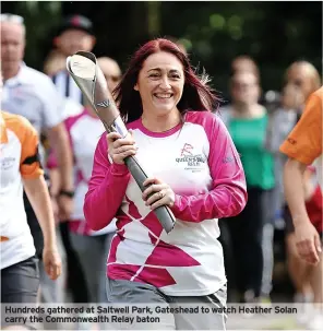  ?? ?? Hundreds gathered at Saltwell Park, Gateshead to watch Heather Solan carry the Commonweal­th Relay baton