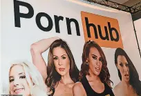  ??  ?? PornHub is being sued for $80million by 40 women who claim it 'profited' from 'sex traffickin­g' related to videos from former PornHub partner GirlsDoPor­n