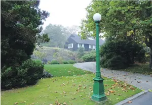  ??  ?? Lampposts provide street light in the evenings. There are no overhead wires in the Uplands.