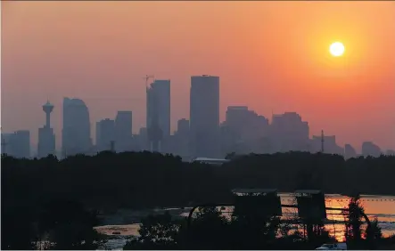  ?? GAVIN YOUNG ?? Calgarians on Thursday inhaled roughly the equivalent of seven and half cigarettes, according to an air-quality monitoring smartphone app.