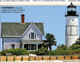  ??  ?? CHARMING: A typical clapboard house and Neck lighthouse on Cape Cod